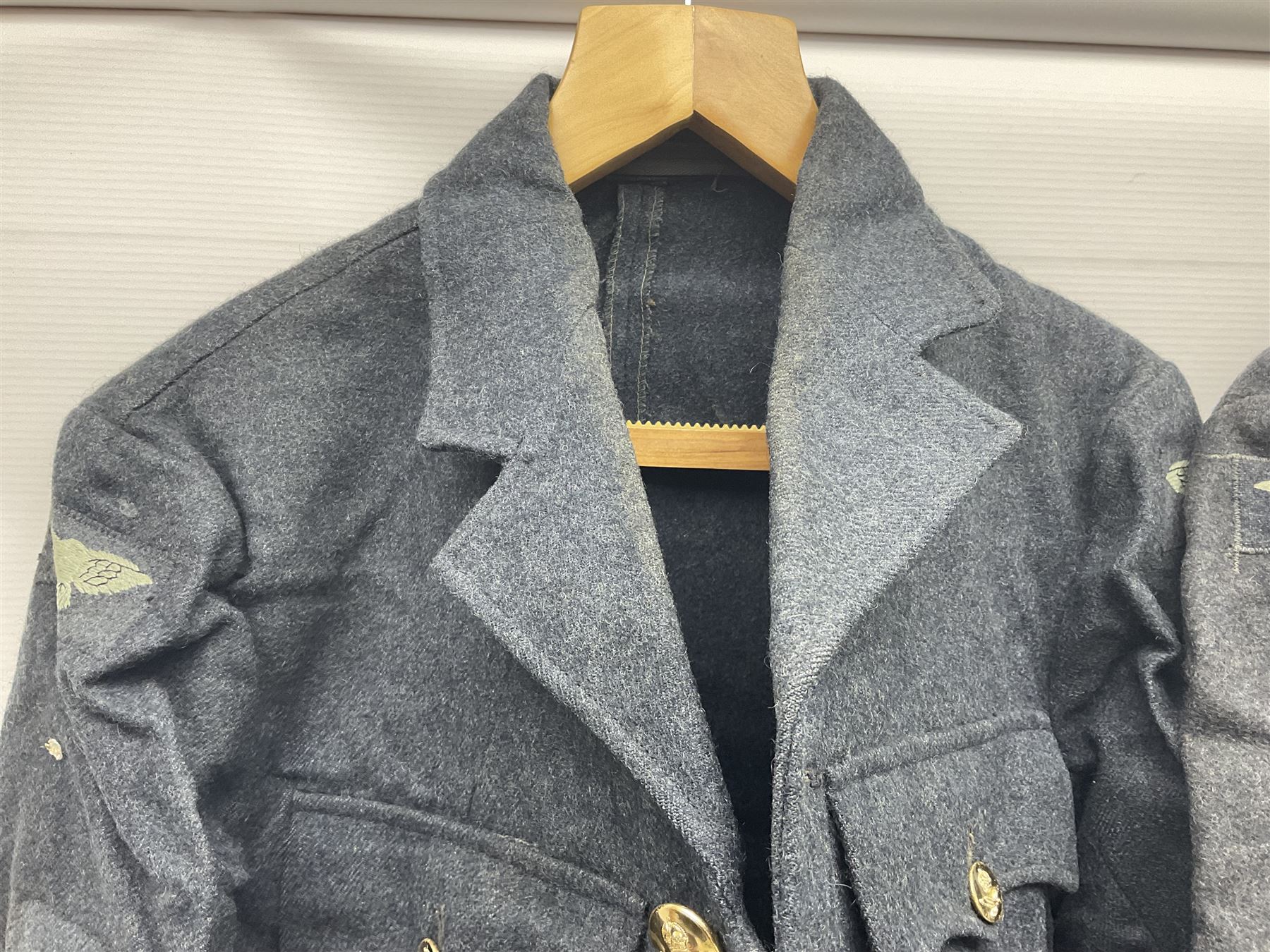 British RAF uniform, including jacket and trousers, modern RAF uniform buttons and a collection of reproduction wartime newspapers