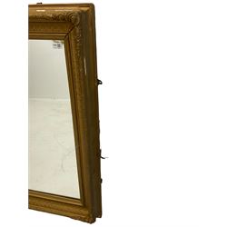 Rectangular mirror in gilt frame, decorated with cartouches and foliate