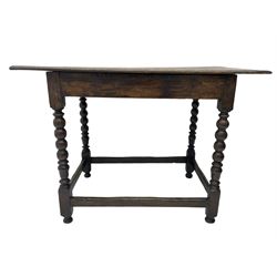 18th century oak table, rectangular breadboarded top, on bobbin turned supports joined by plain stretchers