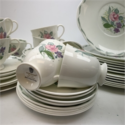 A Susie Cooper for Wedgwood Fragrance pattern tea service, comprising teapot, milk jug, open sucrier, fix teacups, five smaller teacups, five saucers, four further saucers, six side plates, five side plates with frilled rim, a slightly larger side plate, six dessert plates, six larger plates, six bowls, and a sandwich plate. 