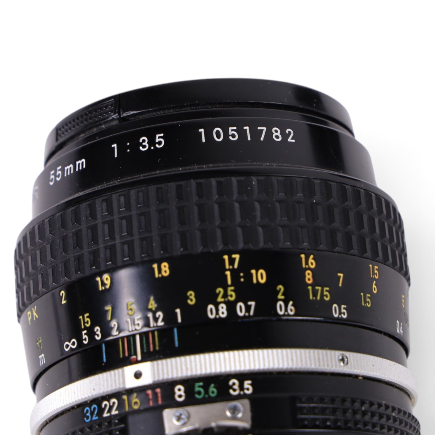Two Micro-Nikkor camera lenses, comprising AF-S DX 40mm 1:2.8G with user manual, serial no. 2055767 and a 55mm 1:3.5 serial no. 1051782
