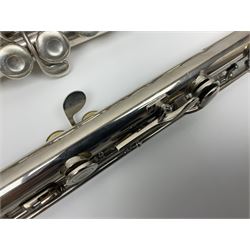 Boosey & Hawkes London Regent three-piece flute, serial no.345447; in B&H Bandhite hard carrying case; and Deg Music Company Inc. USA Claudel Model three-piece flute, serial no.491718, in hard carrying case (2)