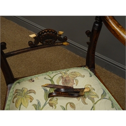  Pair Regency period stained beech elbow chairs, carved cresting rail and shaped pierced splat, upholstered seat, turned tapering splayed supports  