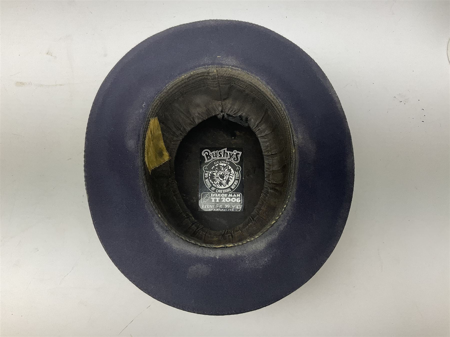 Elizabeth II Yeoman Warders (Beefeater) No.1 Undress blue uniform - comprising tunic bearing label Crown Military Uniforms H.M. Tower of London and bonnet by S. Patey (2) 