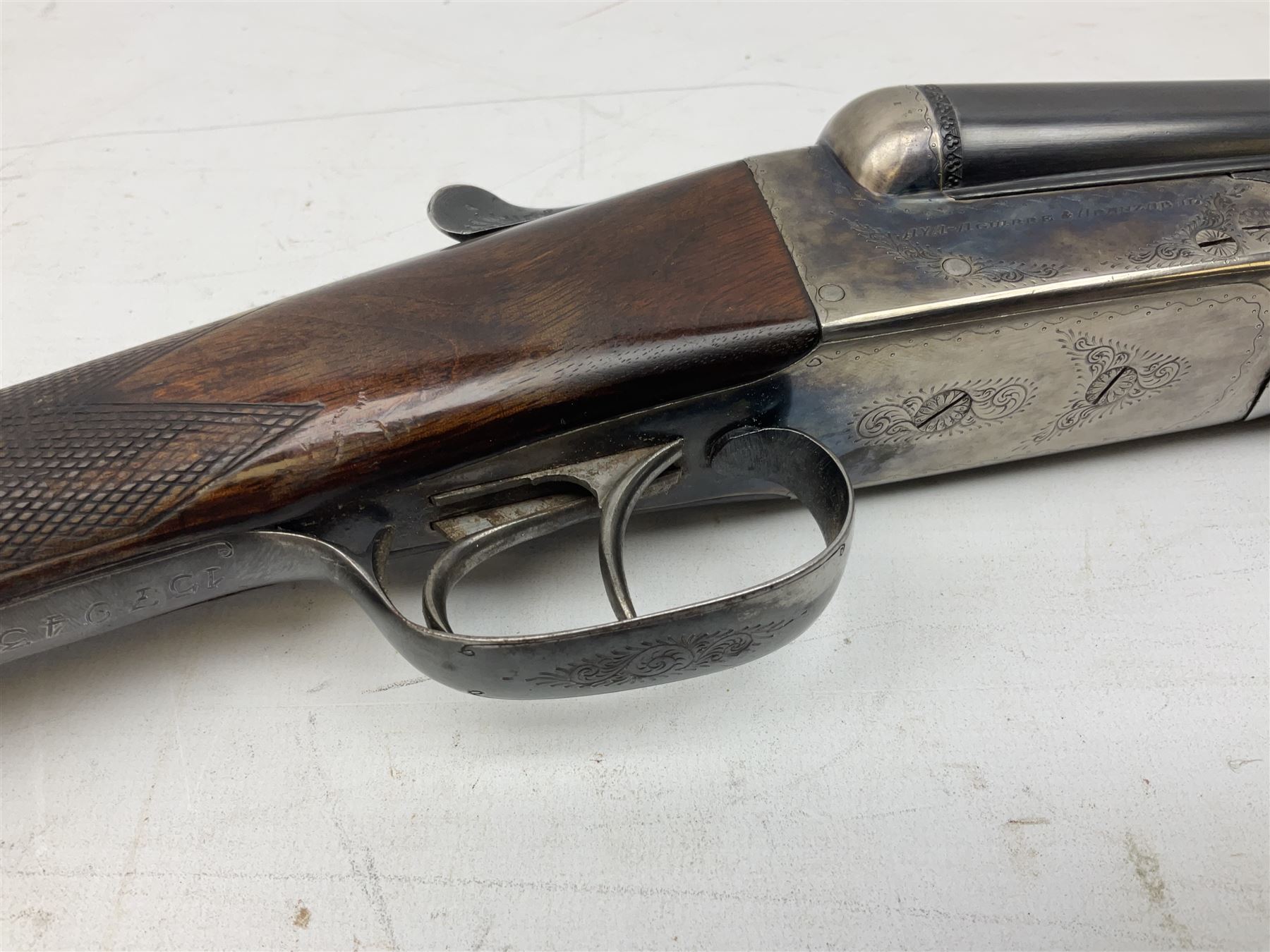 Spanish AYA 12-bore double barrel side-by-side boxlock ejector sporting gun, with 66cm barrels and top safety, walnut stock with chequered grip and fore-end, serial no.157943 L111cm SHOTGUN CERTIFICATE REQUIRED