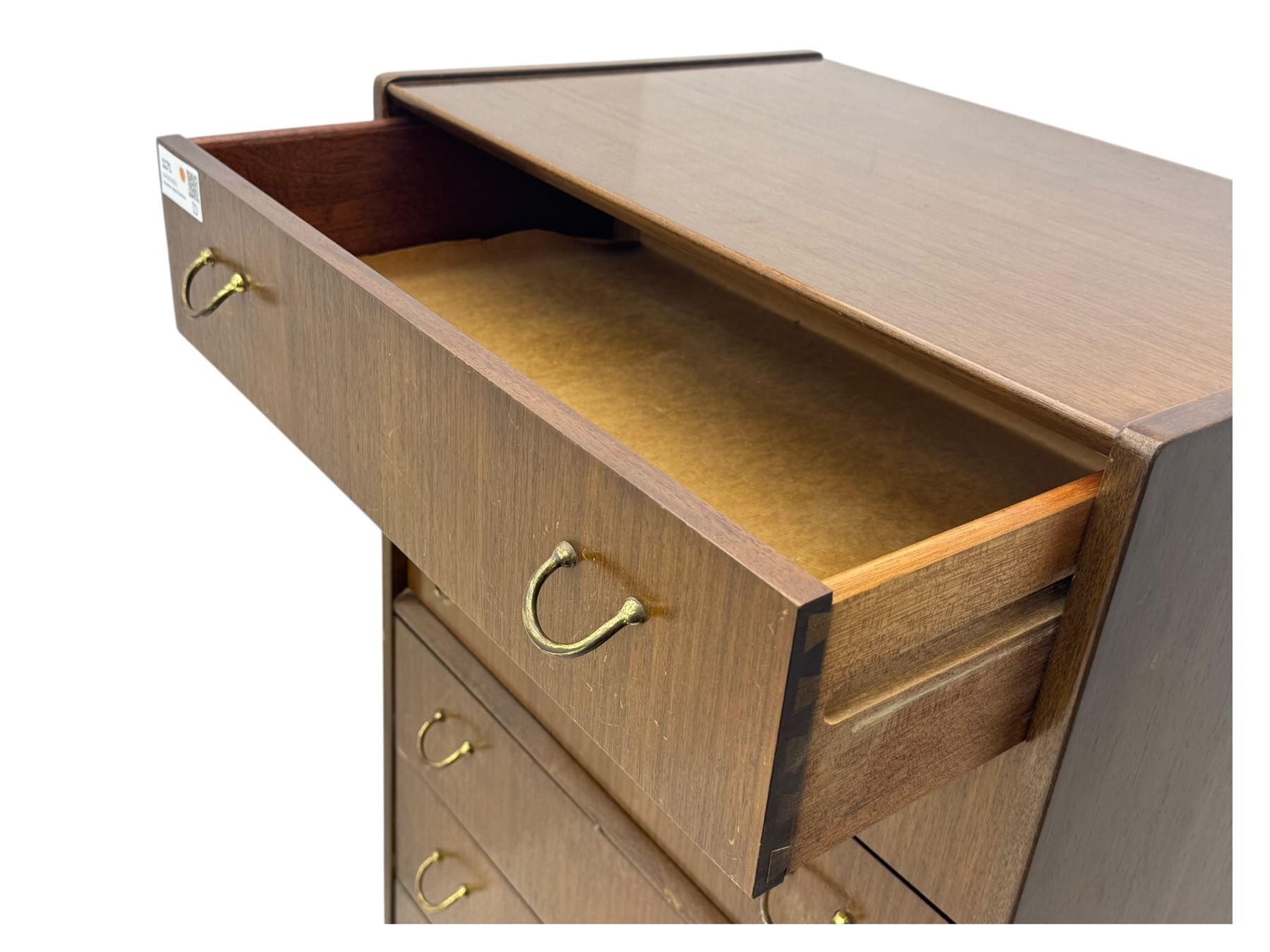G-Plan teak tallboy, seven drawer chest with brass loop handles, ebonise base with adjustable brass terminals