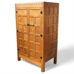 Mouseman - Oak 5' x 3' wardrobe, circa 1950s, scalloped cornice, panelled sides and front,...