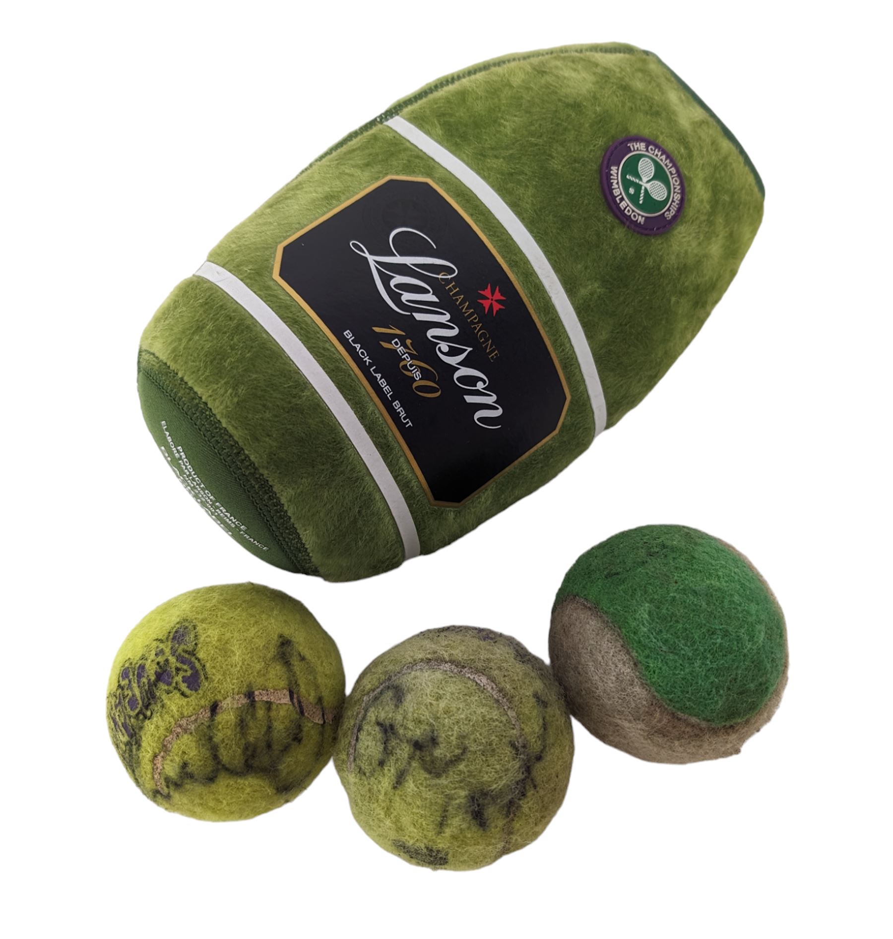 Three tennis balls, two with indistinct signatures, in Wimbledon Lansons Champagne cooler case