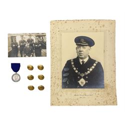 Trinity House Hull - hallmarked silver medal commemorating the visit of the Prince of Wales October 13th 1926; photograph of Captain J. Collins Warden 1934-35; photographic postcard of Capt. Collins onboard ship with other crew members; and six Trinity House uniform buttons