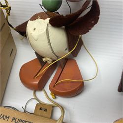 Pelham Puppet - three puppets comprising a painted wooden duck with felt mouth and wings with metal joints H12cm, in original box and instructions; and two further examples Type A cat with a hollow body H12cm, and a boy H23cm (3) 