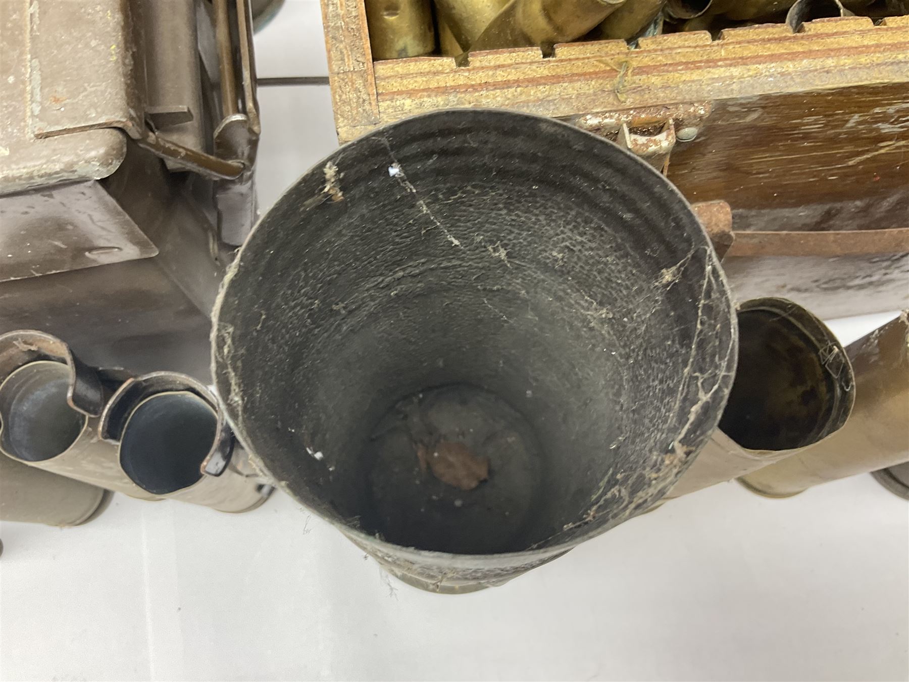 Large collection of shell and bullet casings, including a trench art example, together with a metal cartage case and wooden case