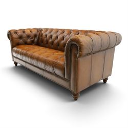 Barker and Stonehouse - traditional shape 'Ullswater' three seater Chesterfield club sofa, rolled back and arms upholstered in buttoned tan leather with studwork, raised on turned feet