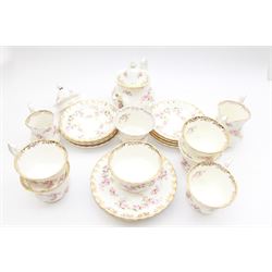 Royal Albert Dimity Rose pattern tea service for six place settings, including teapot, teacups and saucers, sugar bowl and two milk jugs, all with printed mark beneath