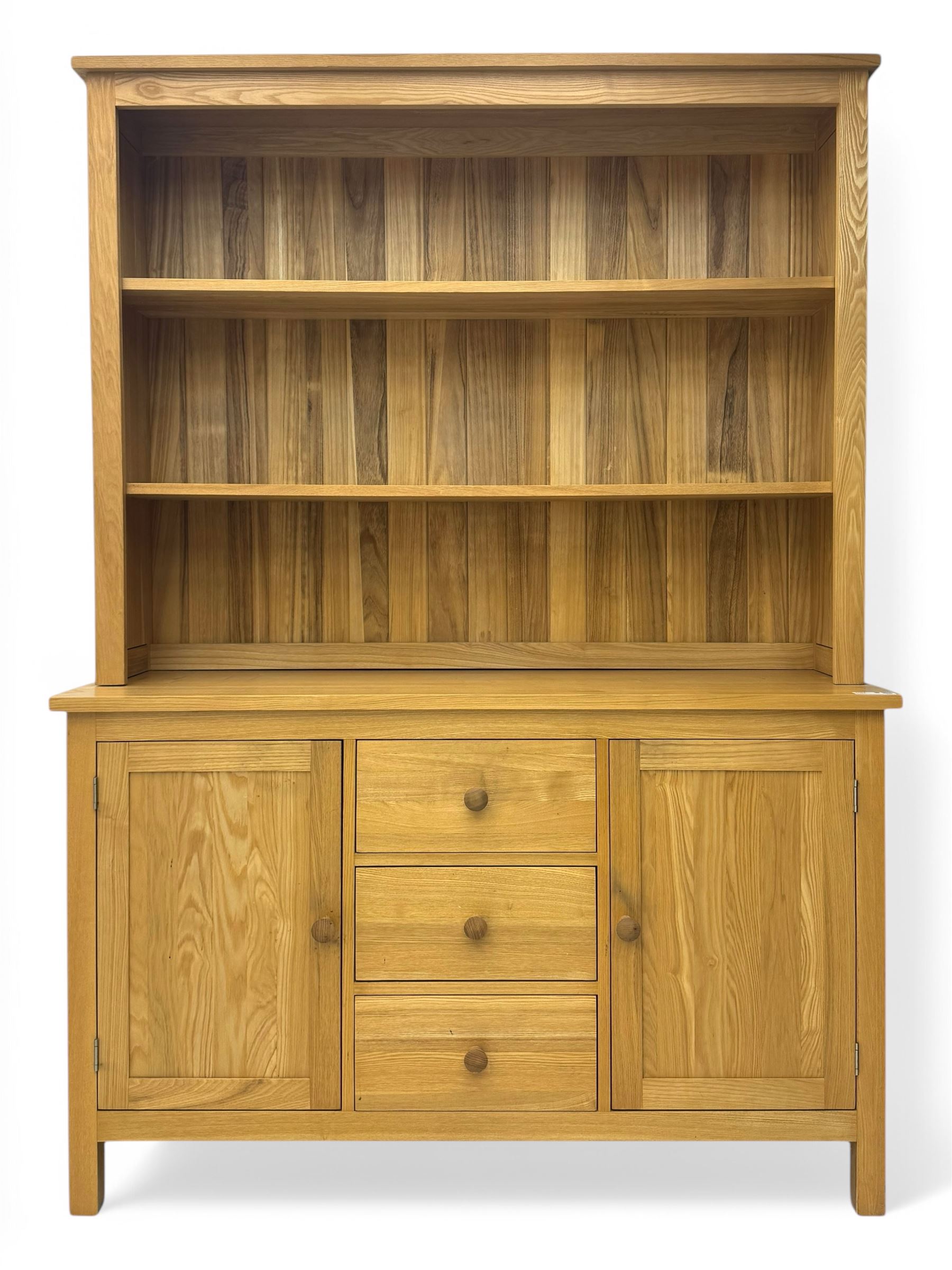 Oak kitchen dresser, raised two-tier back over three drawers and double cupboard