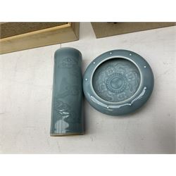 Two Chinese Celadon glazed bowls, one of lotus flower shape and the other with floral decoration to the centre, both with underglaze seal marks, D22cm, together with cylindrical vase and dish