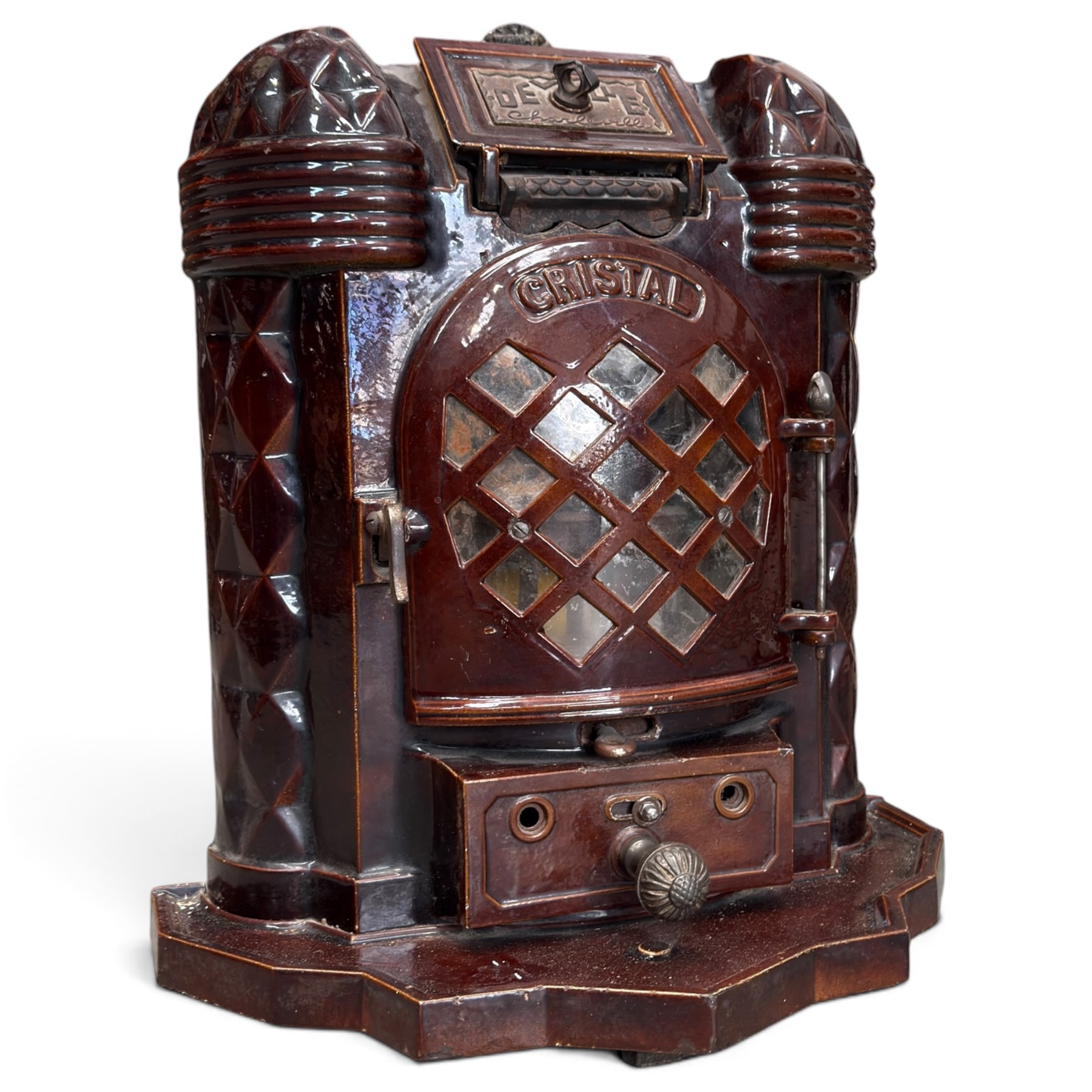 Deville & Cie of Charleville - early 20th century Art Deco cast iron and burgundy enamel 'Cristal' wood burning stove, hinged vent over lattice glazed door and ash drawer, on shaped geometric base, circa 1920