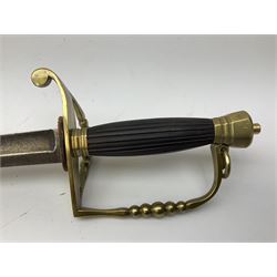 Five-ball spadroon sword with 78.5cm fullered steel blade and brass hilt with fluted swollen grip; in brass mounted leather scabbard, the locket with traces of the makers name John Knubley 11 Charing Cross L97.5cm overall