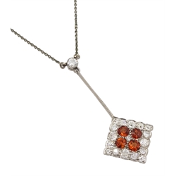 Early 20th century 18ct white gold, milgrain set old cut diamond and orange garnet pendant, on silver chain necklace stamped 925