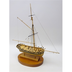  Craftsman built ships model H.M. Cutter Sherbourne on oval mahogany plinth, H57cm   