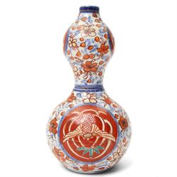 Chinese painted vase, together with a Japanese porcelain double gourd vase and a bottle vase, larger H16cm; together with a set of green stone rings (7)