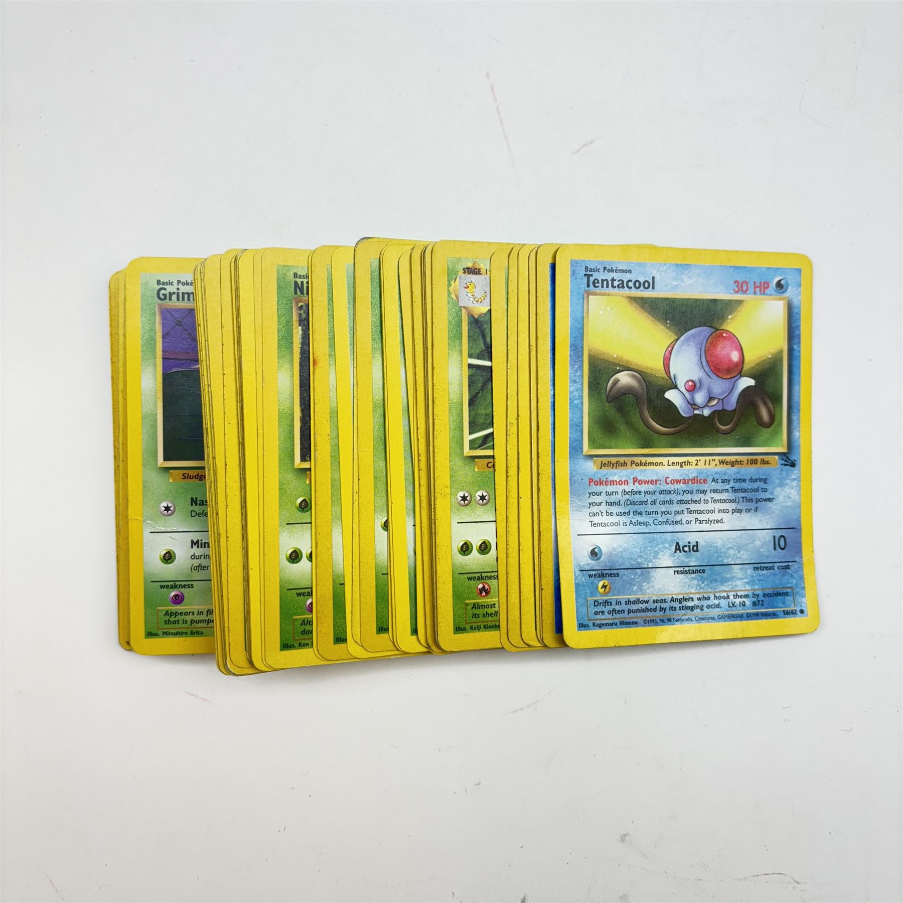 Collection of approximately five hundred vintage Pokemon TCG trading cards, mostly 1999 Wizards examples, including Jungle, Fossil, Team Rocket and Base Set, energy and trainer cards, together with Pokemon collectables including Zapdos 145 Collector Marble Case with eight marbles, Pokemon Gold Version Gameboy game, empty card boxes and Digimon cards
