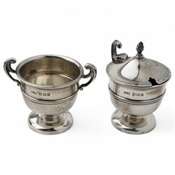 George III silver wine funnel London 1818 Maker William Bateman I, small silver four division toast rack, shell butter dish and two condiments 