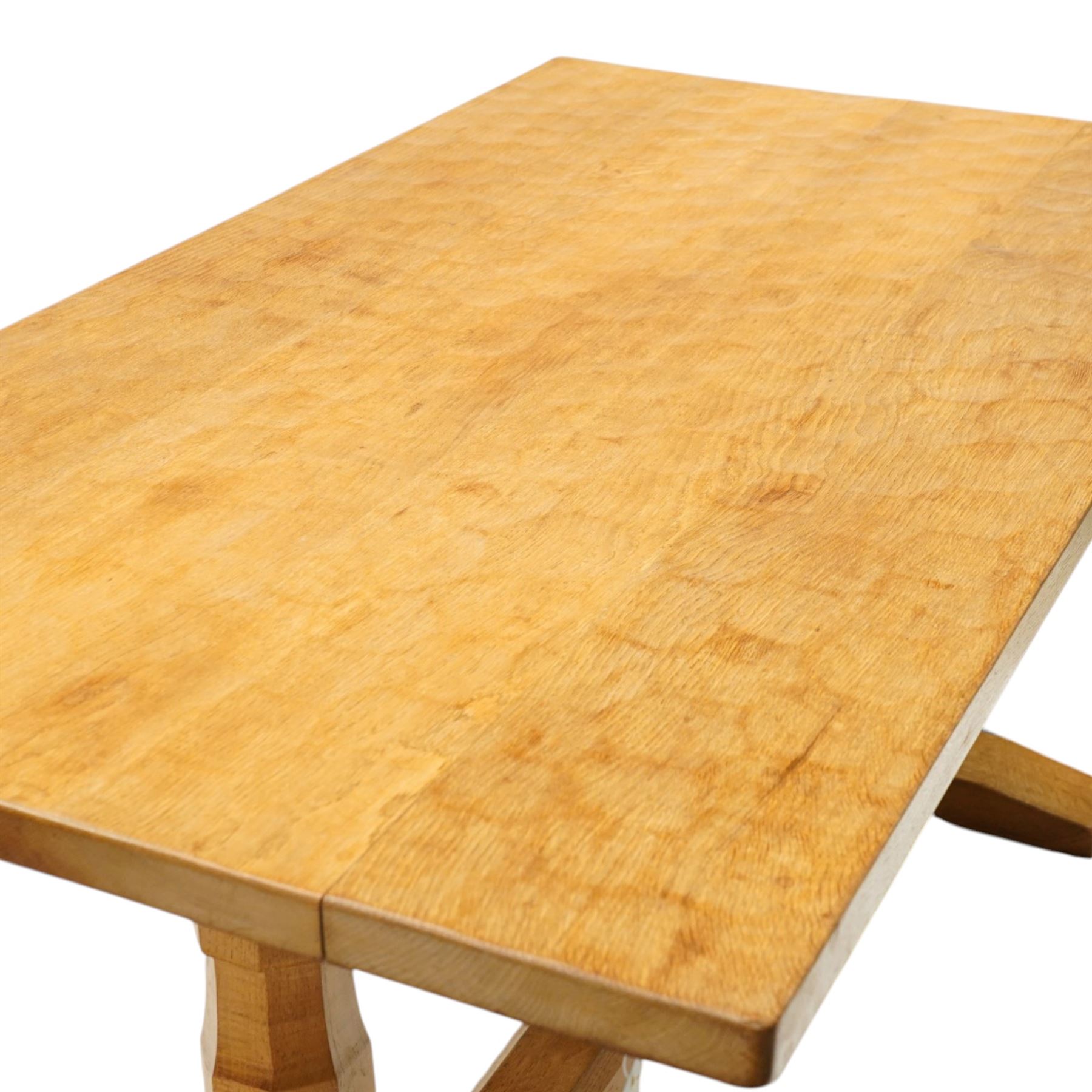 Lizardman - 5' oak refectory dining table, rectangular adzed top, octagonal turned supports united by stretcher with carved lizard signature, by Derek Slater of Crayke