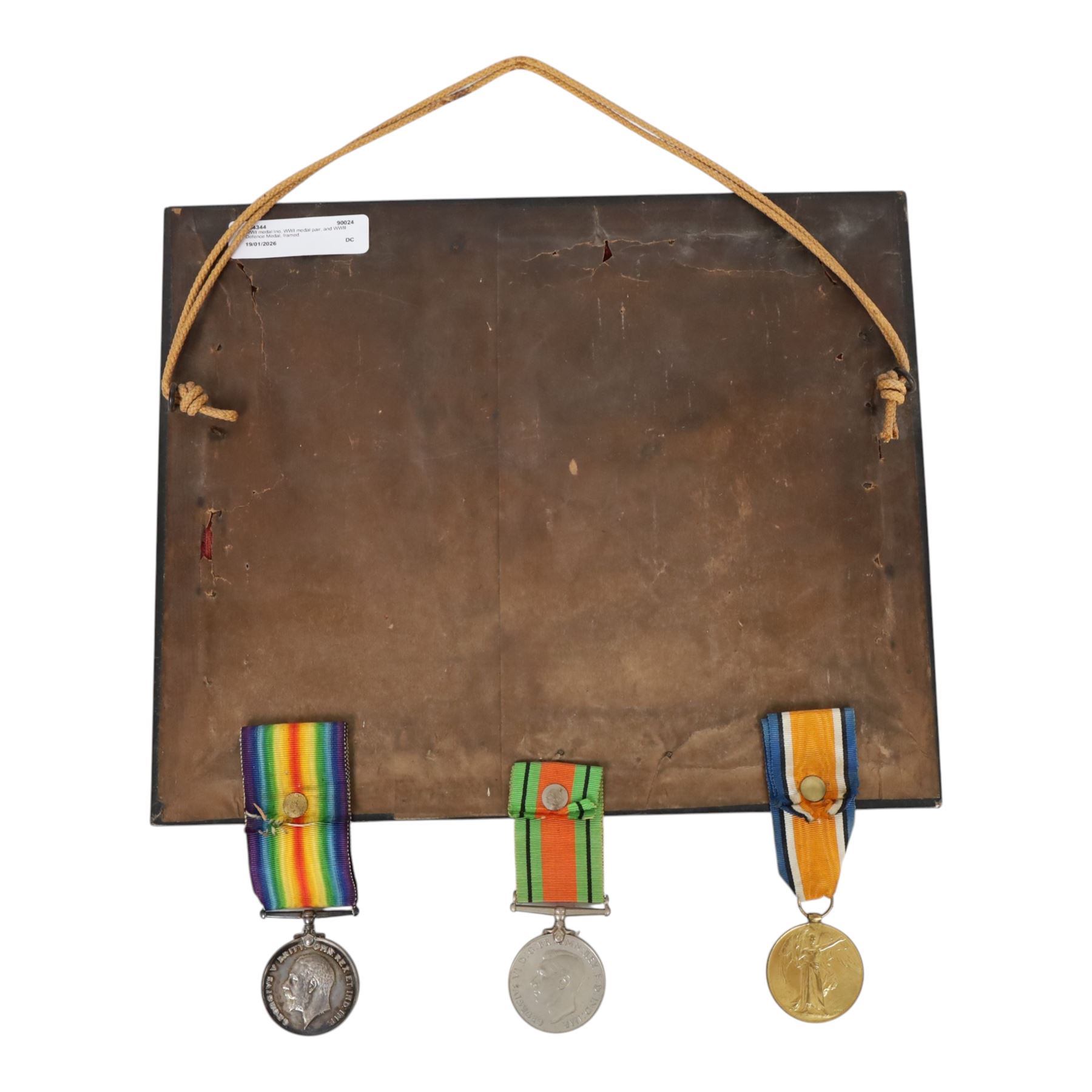 WWI medal trio; Victory medal, 1914/15 star and War medal, framed, together with WWI medal pair; victory and defence medals, awarded to 5832 Pte J Wilson North'O Fus, and WWII Defence Medal, framed