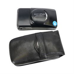 Olympus MJU Zoom 115 all weather compact camera serial no. 5555309, in soft shell case with instructions, together with an Olympus MJU 740 all weather digital camera serial no. C53508094, boxed with instructions and a Sony Handycam DCR HC24 serial no. 1251456, in soft case with instructions 
