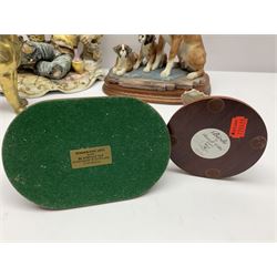 Three Border Fine Arts figures including Boxer with Pups, Capodimonte figure of a drunken pirate, and a brass dog (5)