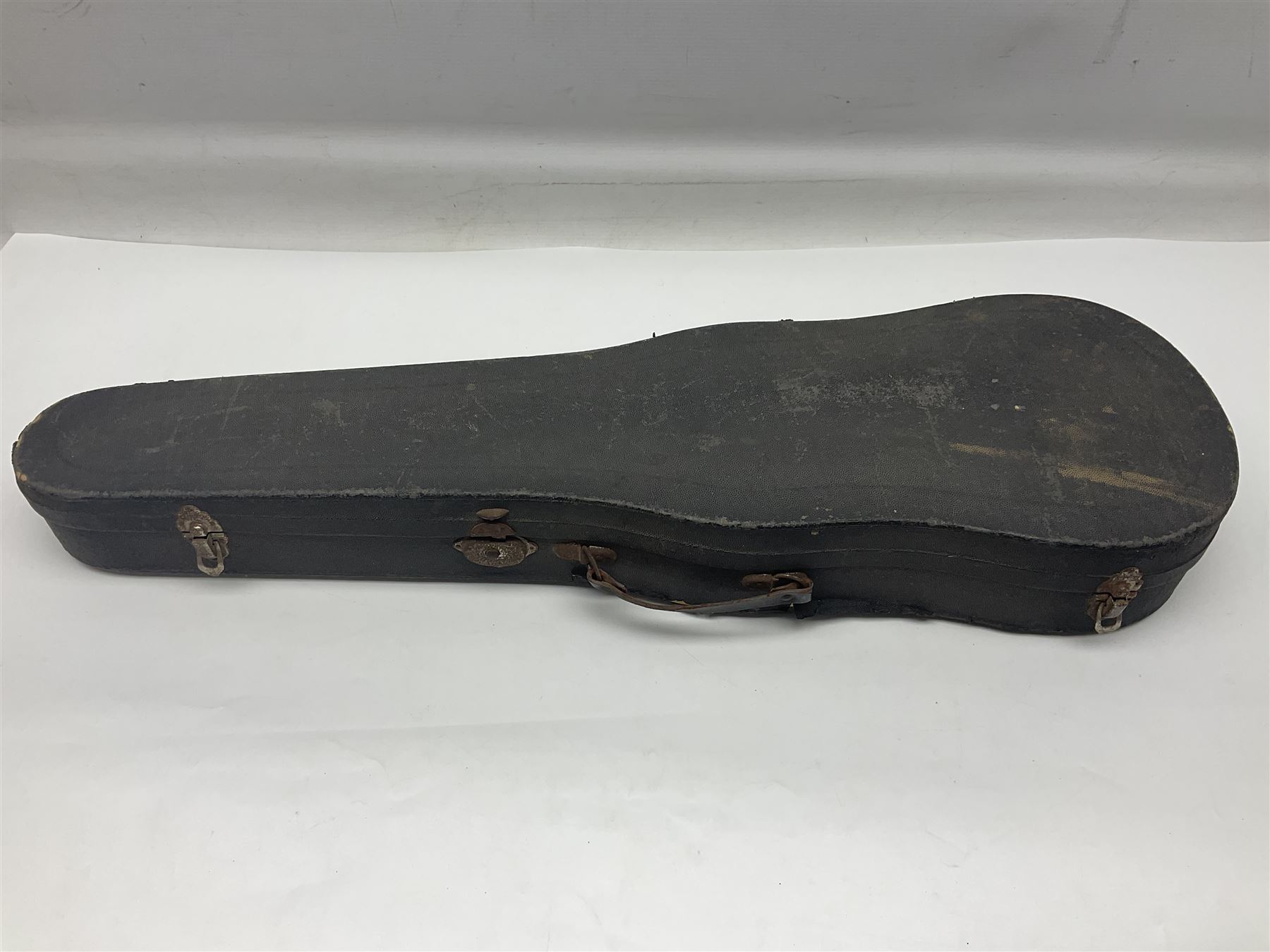 German trade violin c1900 copy of a Maggini with 36.5cm two-piece maple back and ribs and spruce top; double scroll; L60cm overall; in carrying case