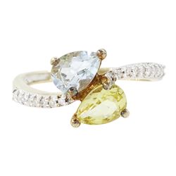 9ct white gold quartz, aquamarine and diamond crossover ring, single pear cut aquamarine a...