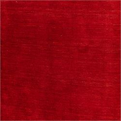 Indian hand-knotted wool Gebbeh design carpet, of rectangular form, woven in a rich madder red tone