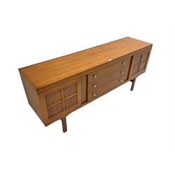 Elliotts of Newbury (EoN) - mid-20th century teak sideboard, fitted with three central drawers flanked by two cupboards, raised on square supports 