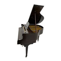 A mid 20th century English baby grand piano by Osbert, with an iron frame and overstrung stringing in a mahogany case,  conforming Lyre with sustain and una corda pedals and music desk, with original stringing, hammer action, dampers and felts, 7-1/4 octaves with 88 original ebony and ivory covered keys, with stool