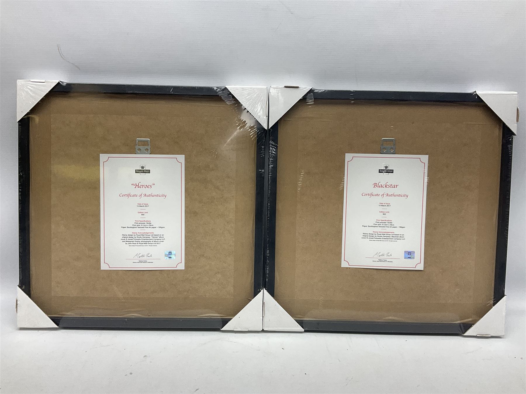 Set of four Royal Mail David Bowie limited edition album stamp prints, comprising Blackstar, Heroes, Let's Dance and Aladdin Sane, all framed and in original packaging, H43cm W43cm