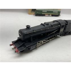 Hornby Dublo - 2-rail - Class 8F 2-8-0 locomotive No.48109 in BR black; Class R1 0-6-0 tank locomotive No.31337 in BR black; and Met-Vic Diesel Co-Bo locomotive No.D5702 in BR green; together with 3-rail Class 4MT Standard Tank 2-6-4 locomotive No.80054 in BR black; three unassociated boxes and one unboxed (4)