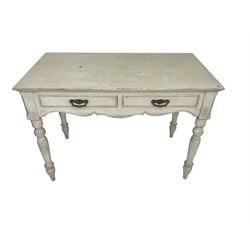 Painted pine side-table, rectangular top over two drawers with shaped apron, raised on turned supports