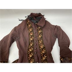 Victorian ladies riding habit, the two-piece construction in brown with embroidered floral velvet edging