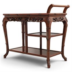 20th century Chinese ornately hardwood tea trolley, rectangular top with handle, pierced frieze above a half shelf above a full length undertier, raised on shaped supports