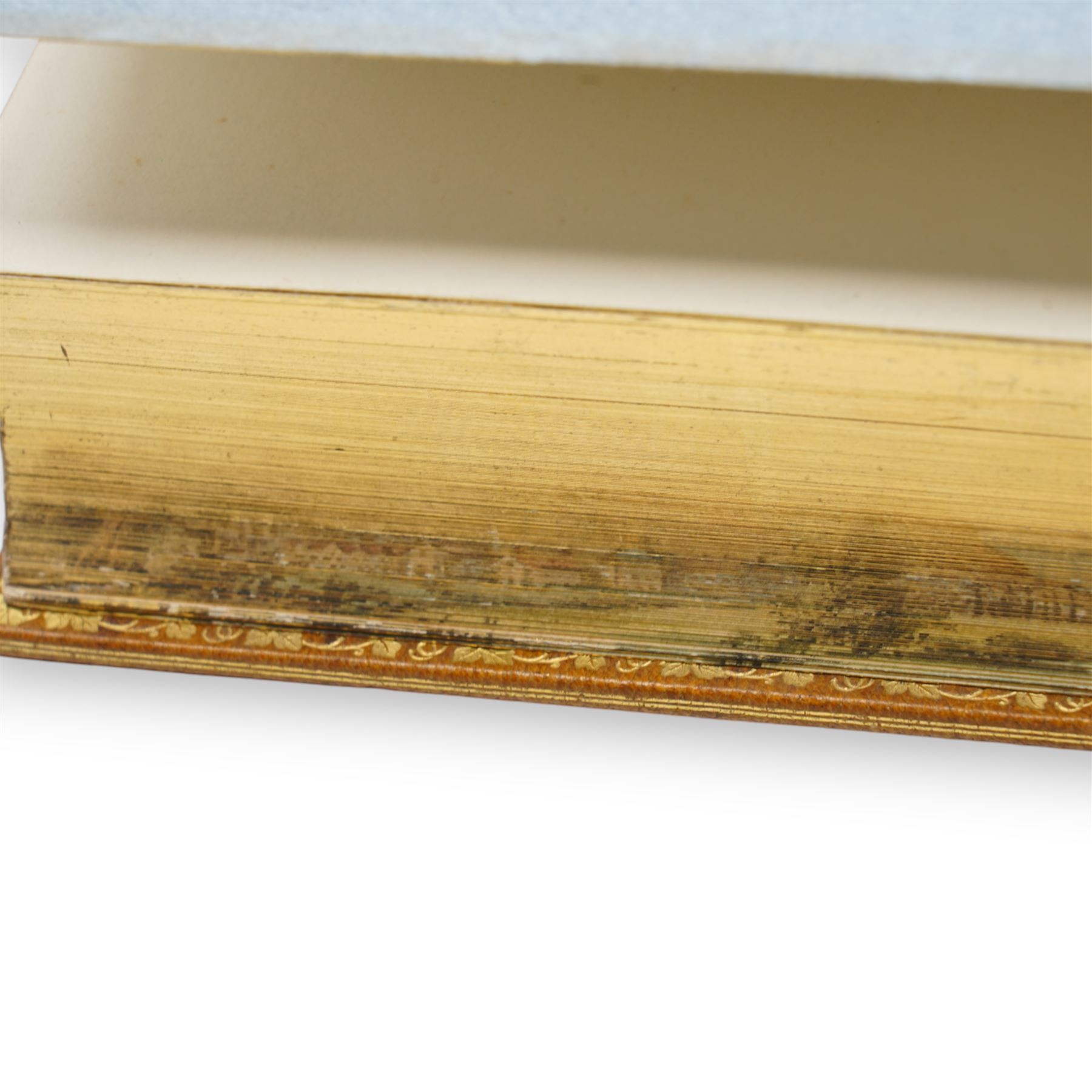 Norway, Arthur H - 'Highways and Byways in Yorkshire' illustrations by Joseph Pennell and Hugh Thomson, published Macmillan 1899, bound in tan morocco with gilt and black decoration to cover and spine, all edges gilt with a fore edge painting by C B Currie (Caroline Billin Curry) depicting a view of Scarborough.  The book is signed by Miss Currie and numbered '71'. The binding is by Sotheran & Co, London.  C B Currie produced around 170 fore edge paintings for Sotheran & Co between the two World Wars