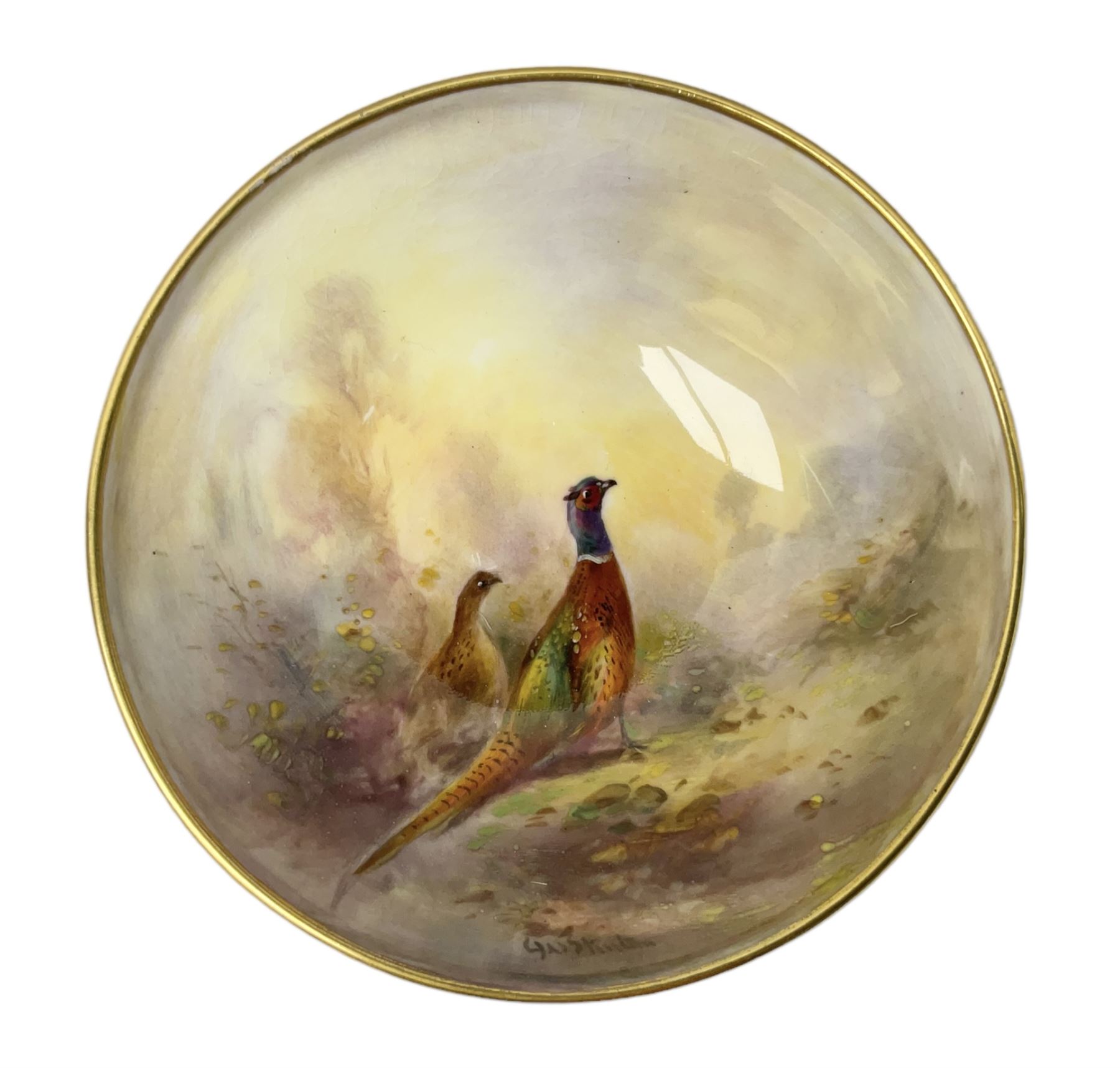 1938 Royal Worcester circular pedestal pin dish, decorated with pheasants in a landscape by James Stinton, with printed mark beneath, D10.5cm