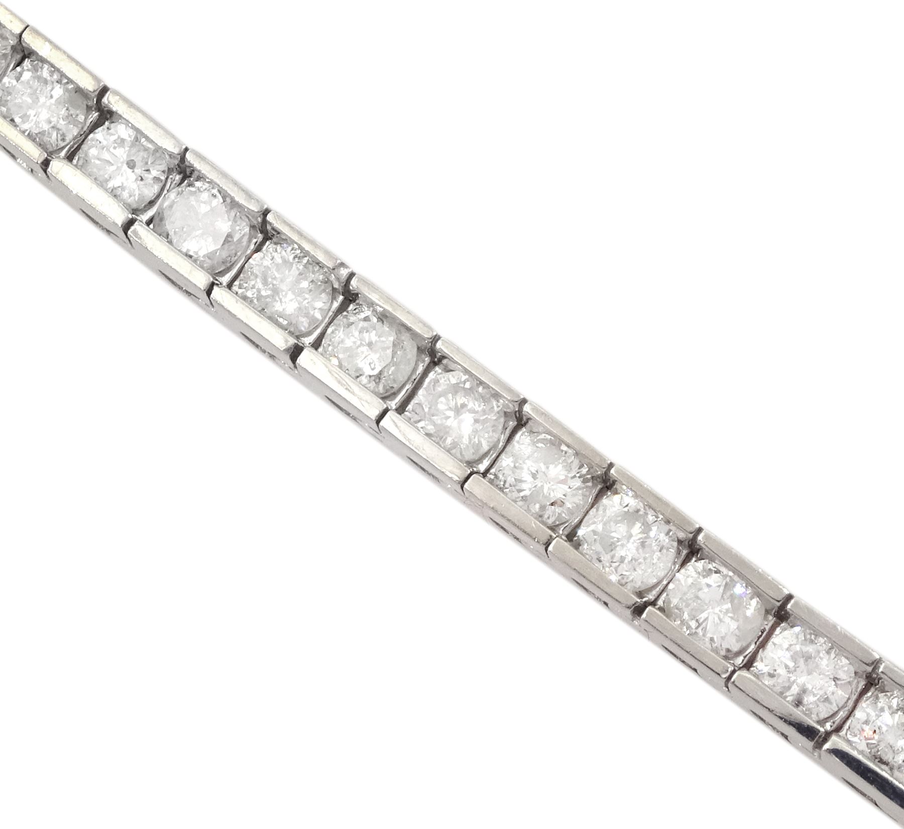 White gold round brilliant cut diamond line bracelet, stamped 14K, total diamond weight approx 4.85 carat