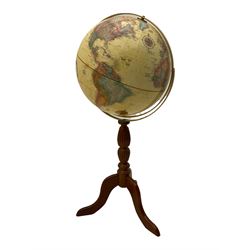 Globe on wooden stand