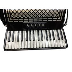 Italian Serenellini bass piano accordion in black and silver with jewelled decoration, twenty pearline keys and seventy-two buttons L41cm; in black simulated reptile skin case with original price ticket from Birmingham Accordion centre for £3200
