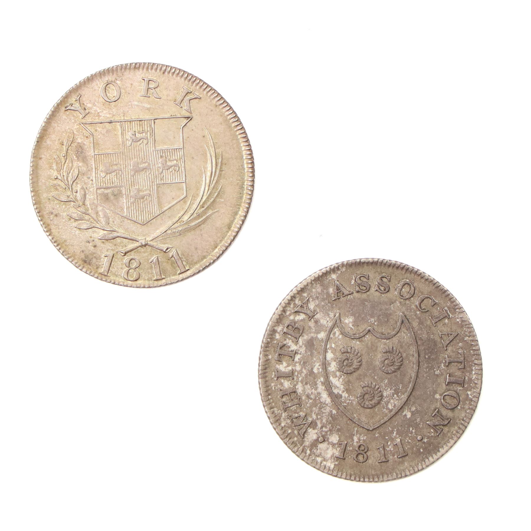 Whitby Association silver shilling token 1811 and a Cattle & Barber York silver shilling token 1811 