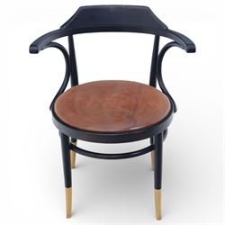 Thonet - 20th century ebonised elbow chair, bentwood construction with a circular brown leather seat, tapering legs with exposed wood supports