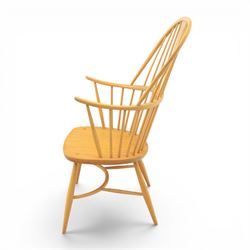 Ercol - Windsor 'Chairmakers' light ash armchair, with traditional spindle backrest, above a dished seat, with cylindrical supports united by a carolean stretcher