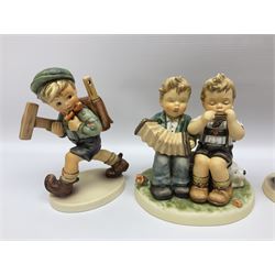 Twenty five Hummel figures by Goebel, to include Tuning up, Blessed Event, Book Worm, The Little Architect etc 