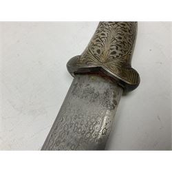 Indian Khanjar dagger with 28cm curving damascus steel blade inlaid with silver floral emblem, white metal and niello style grip in the form of a bird's head with pronounced beak and matching scabbard L44cm overall
